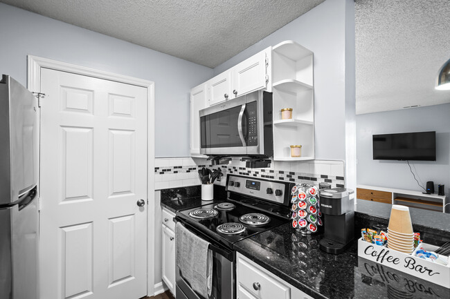 Upgraded Granite Counter Tops - Crown Point Luxury Apartments at Crown Point