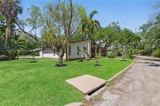 Building Photo - 4926 Camellia Way S