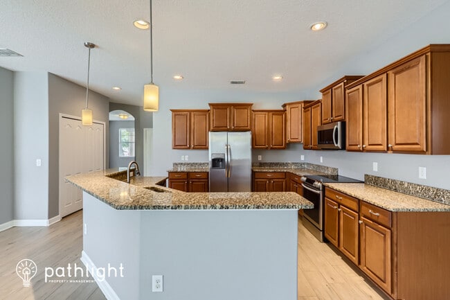 Building Photo - 9673 Orange Jasmine Way