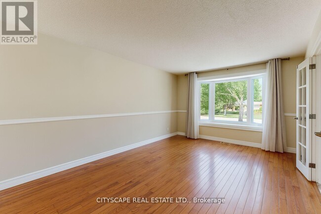 Building Photo - 65 Riverglen Dr