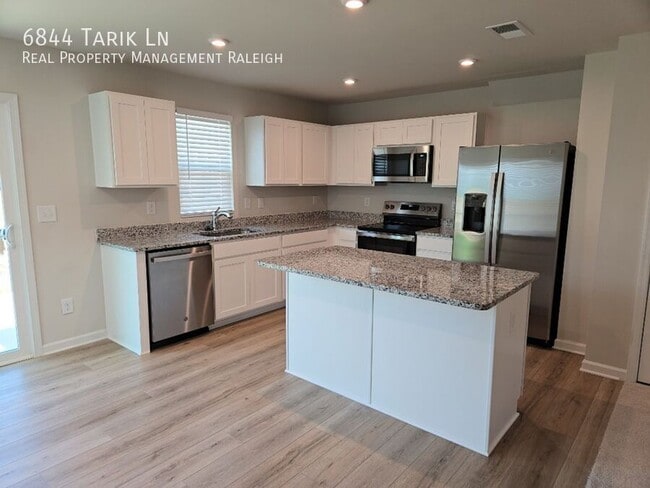 Building Photo - 6844 Tarik Ln
