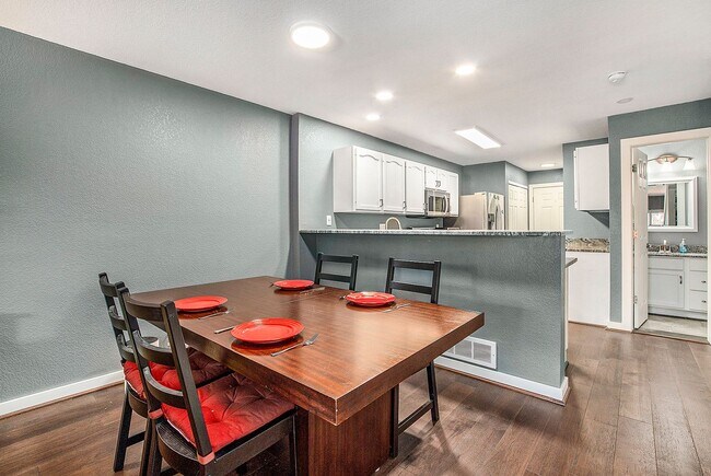 Building Photo - End Unit Townhome with Large Patio and Amb...