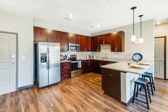 Our kitchens combine functionality and style with plenty of storage and modern appliances to enhance your culinary experience. - 360 at Jordan West