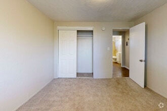 2BR, 2BA - 750SF - Bedroom 1 - Alpine Flats