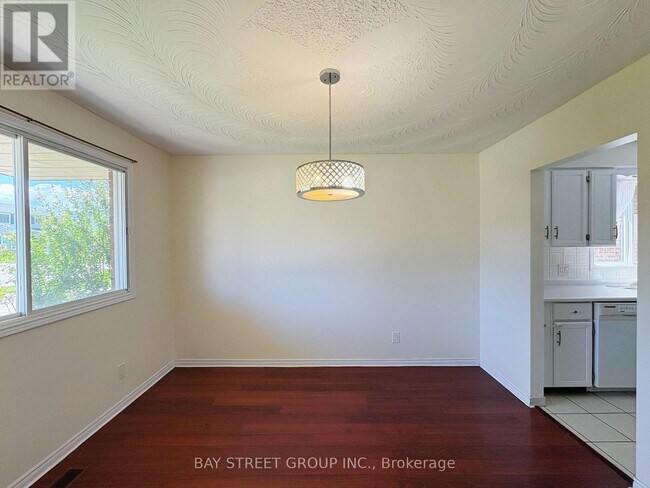 Building Photo - 7349 Nathan Crescent