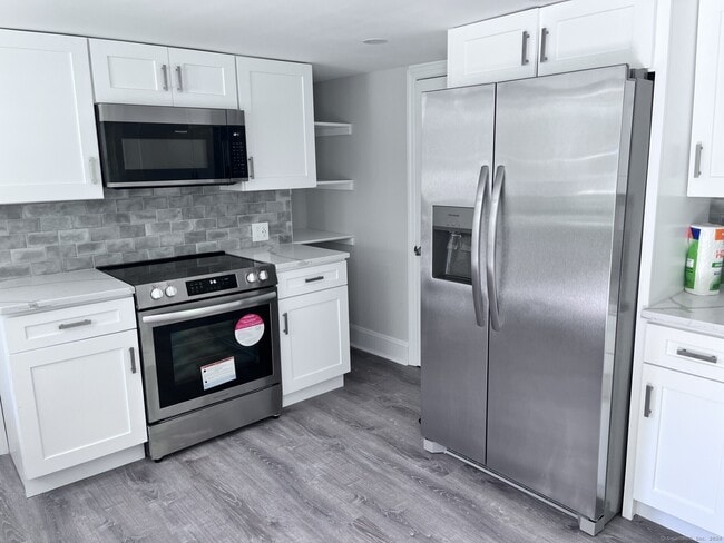 Building Photo - 6088 Main St