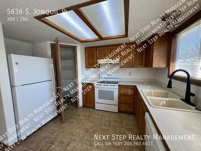 Foto del edificio - 5636 S Jonquil Pl