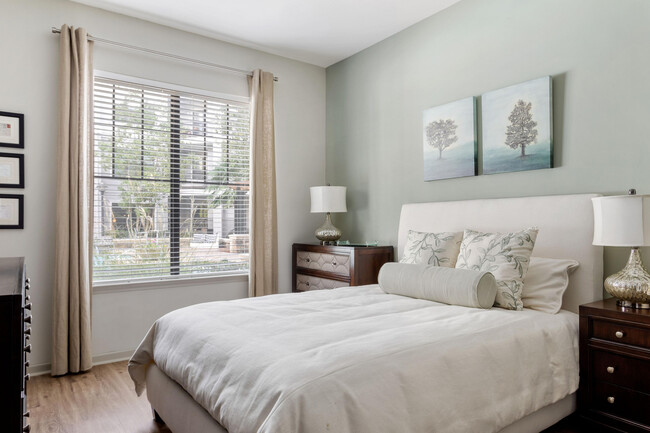 Experience serene living in this beautifully designed bedroom oasis. - Rowe Vinings