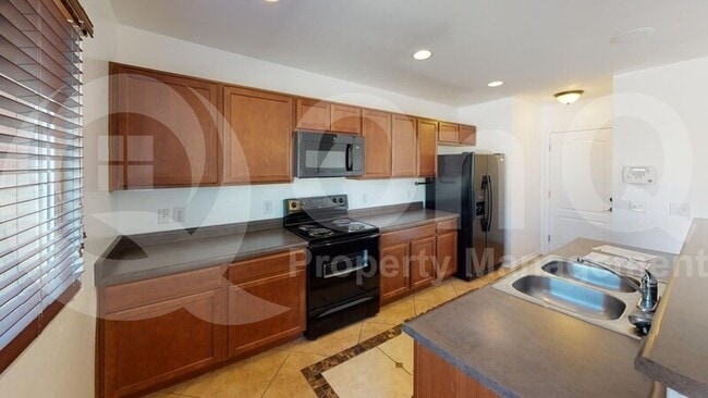 Building Photo - 7037 S Red Maids Dr