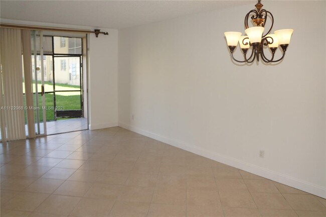 Building Photo - 6090 NW 64th Ave