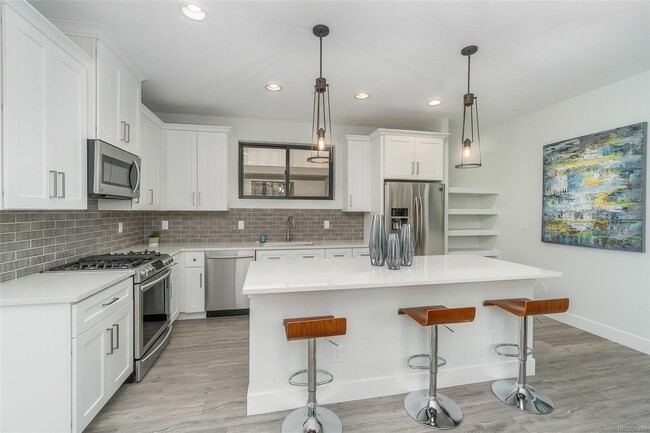 Kitchen with all stainless appliances - 5632 S Curtice St