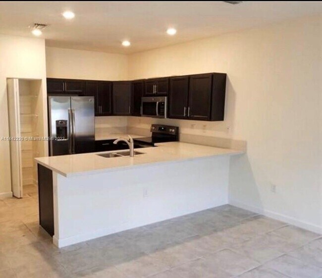 Foto del edificio - 10588 W 33rd Ln