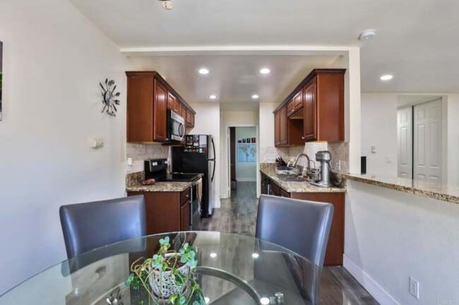 Building Photo - Sunny & Spacious 3BR Condo – Minutes from the Beach