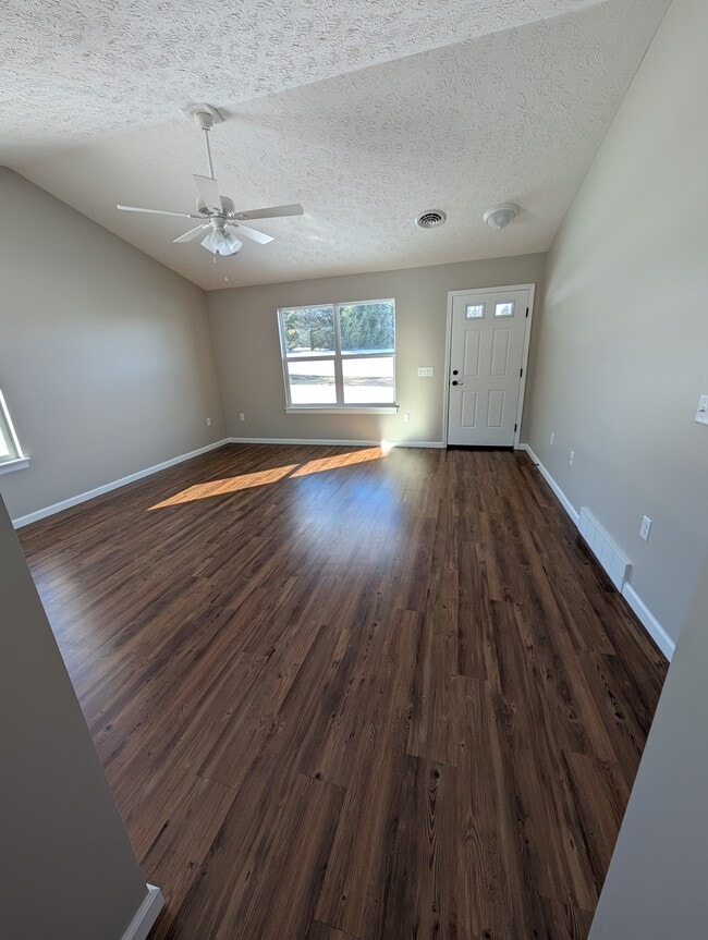 Living Room - End Small Unit - The Fairway at Waters Edge