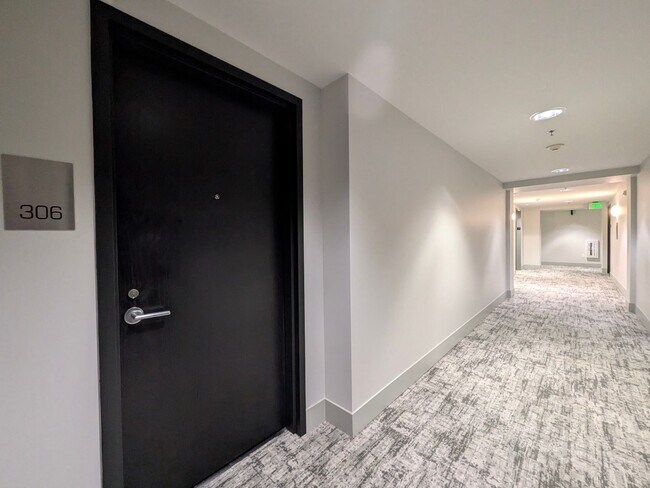 Building Photo - Exquisite Condominium at the Renowned Waterfront Pearl with Views of the River, Work Out Facility...