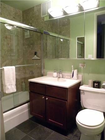 Bathroom w/ slate floor and marble shower - 655 W Irving Park Rd