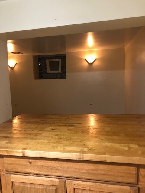 Kitchen with pass through to living area - 5207 N Latrobe Ave