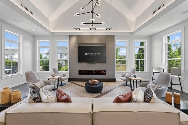 Settle in by the fireplace for conversation or quiet downtime. - The Madison at Marshfield