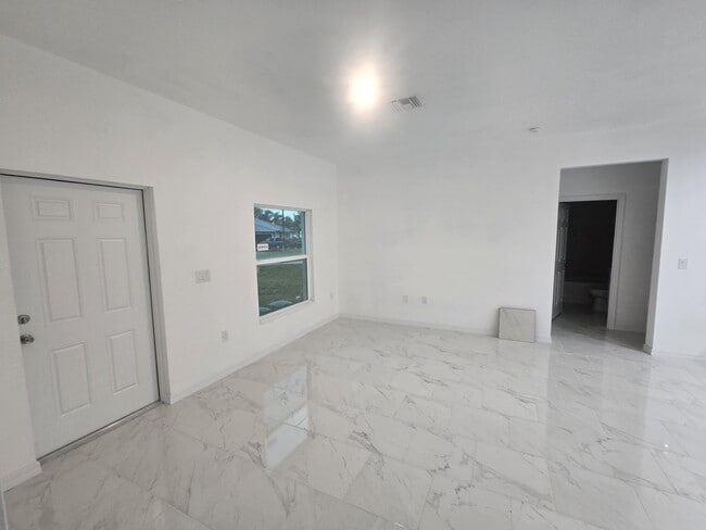 Building Photo - BRAND NEW THREE BEDROOM, 2 BATH, 1 CAR GAR...