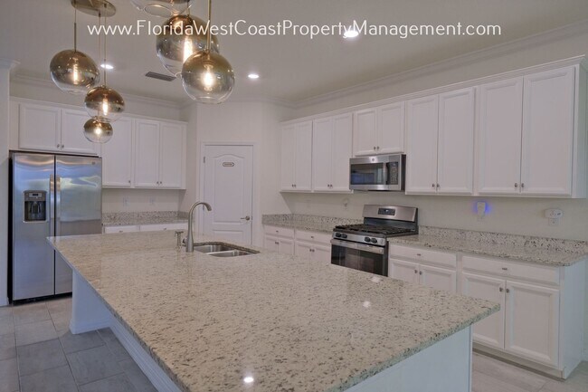 Foto del edificio - OUTSTANDING POLO RUN POOL HOME! 3 BEDROOMS...