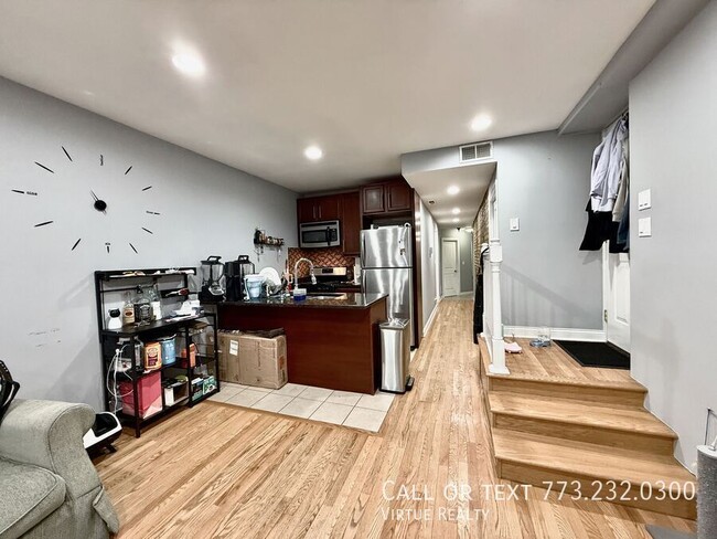 Foto del edificio - 5791 N Ridge Ave
