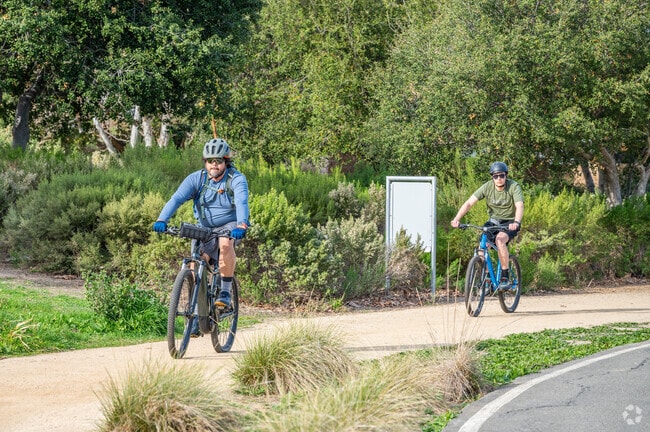There are dirt and paved pathways for cycling on the Shady Canyon Trail.