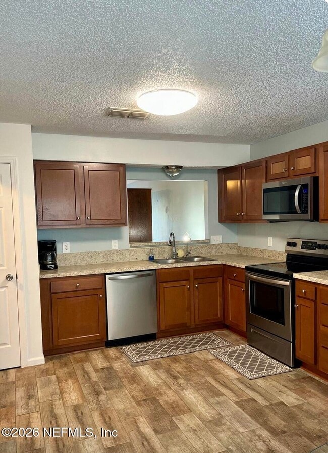 Building Photo - 12619 Ashmore Green Dr N