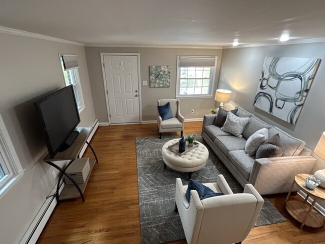 Living room w hardwood floors - 327 N Orange St