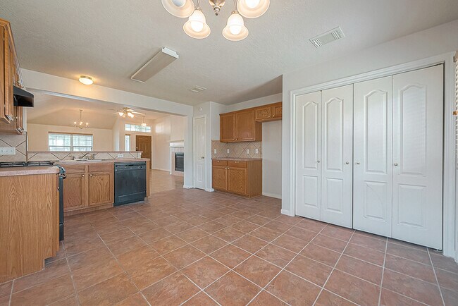 Building Photo - Spacious 3-Bedroom, 2-Bathroom Home with F...