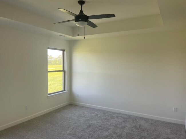 Dormitorio principal - 1901 Wes Milligan Ln