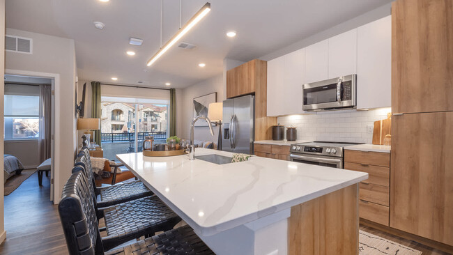 Kitchen with Stainless Steel Appliances and Quartz Countertops - Aventine Littleton