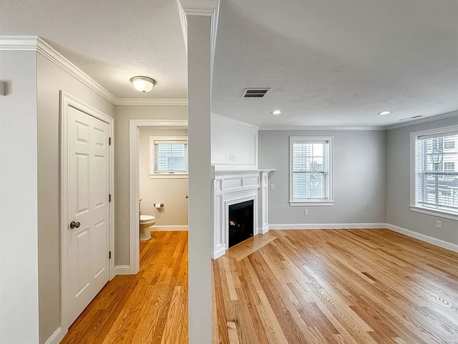 Living Room Fireplace and Half Bath - 1400 Gorham St