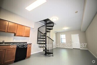7413-7415 S Broadway