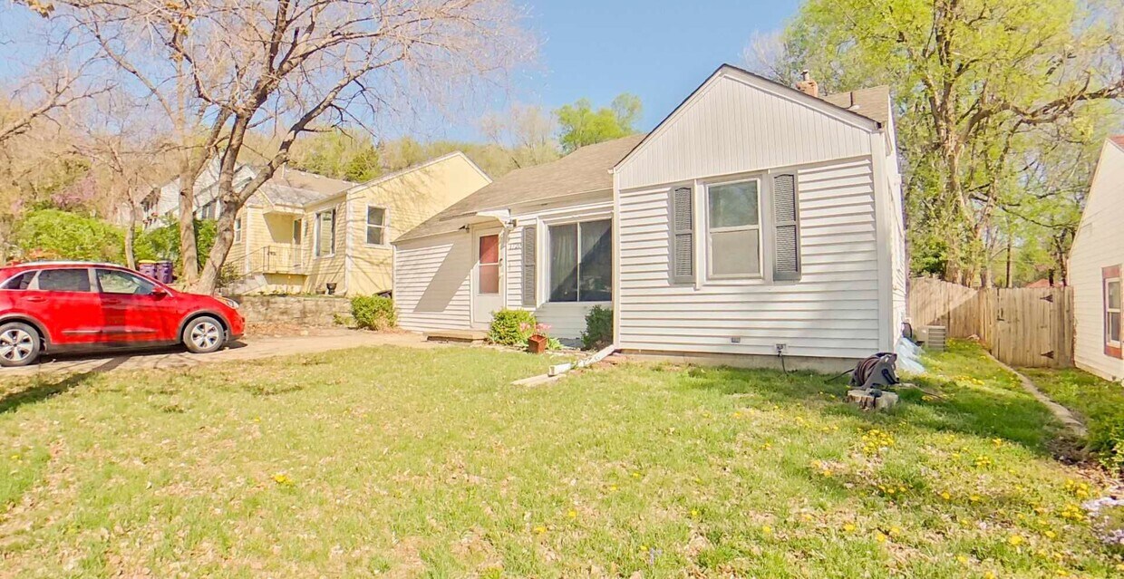 Primary Photo - Backyard Deck + Fenced-in Yard + Bonus Roo...