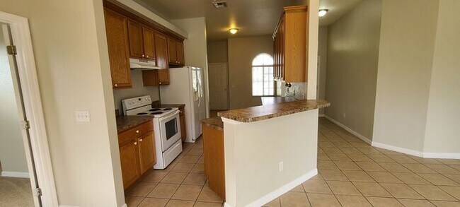 Building Photo - Single Family Home in Poinciana Tuscany Pr...