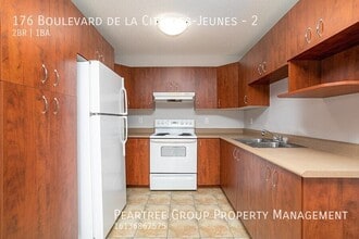 Building Photo - 176 Bd de la Cité-des-Jeunes