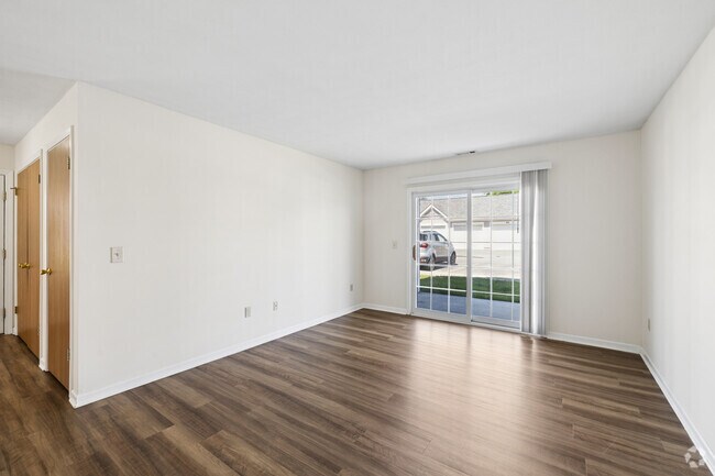 Apartamento Birch de 2 habitaciones y 2 baños - 1183 pies cuadrados - Sala de estar - Stillwaters, Hickory Grove Apartments