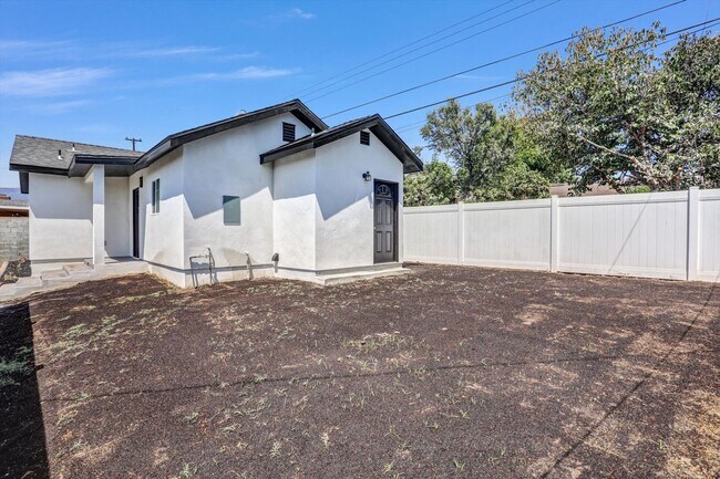 Building Photo - 9983 Vernon Ave