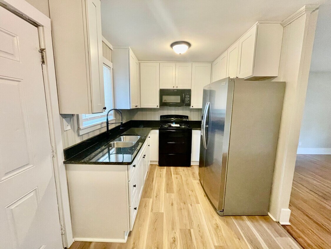 Primary Photo - Welcome to Burgess2937, A Newly renovated charming 2-bedroom, 1-bathroom Duplex located in the vi...