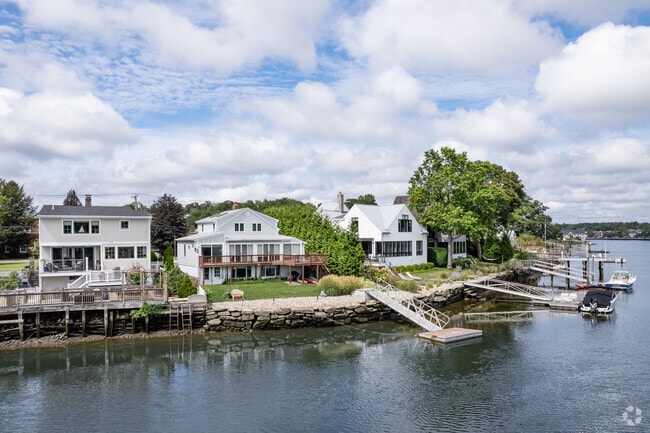 Waterfront homes in Westport offer shimmering views of the Saugatuck River.
