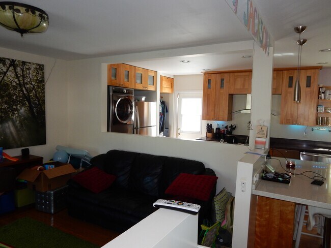 family room into kitchen - 2555 Colby Ave