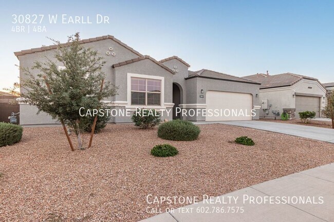 Foto del edificio - Uncover Your Ideal Residence: A 4-Bedroom ...