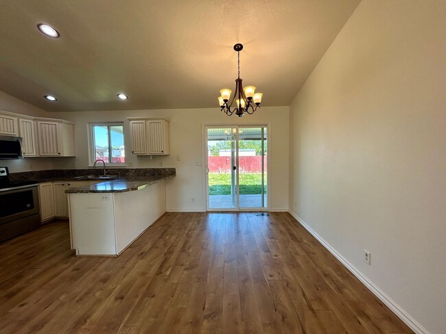 Building Photo - Spacious 4-Bedroom Home with RV Parking & No Backyard Neighbors
