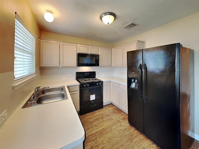 Building Photo - 7407 Tonsley Springs Dr