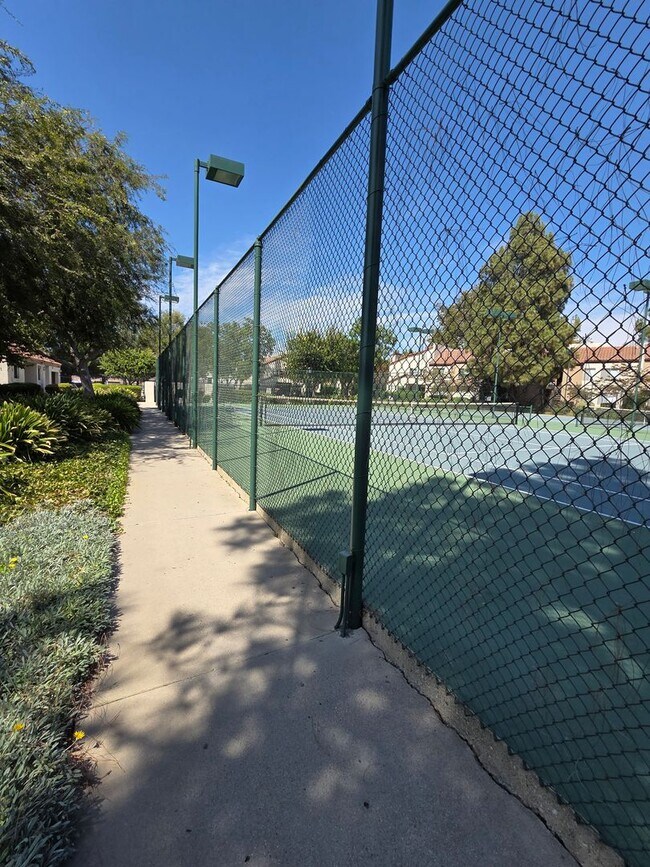 Building Photo - Sharp one level 3-bedroom 2 bath condominium which features two patios. Many amenities.