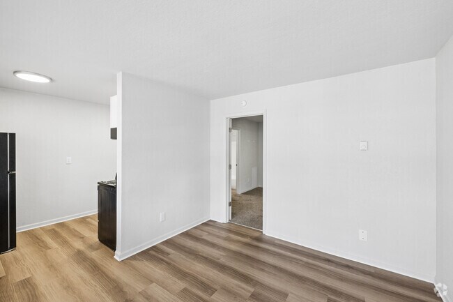 1 habitación, 1 habitación - 414 pies cuadrados - Sala de estar - East Beach Apartments
