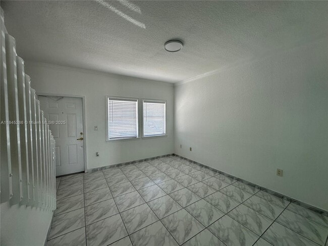 Building Photo - 9837 W Okeechobee Rd