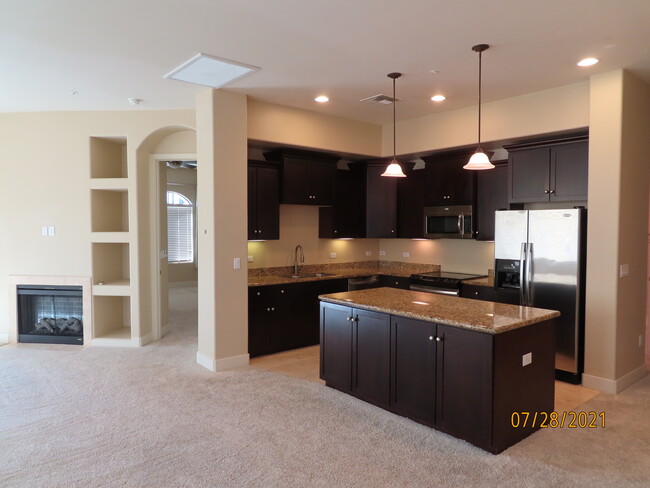 Kitchen open to Living room & Dining Area - 15550 S 5th Ave