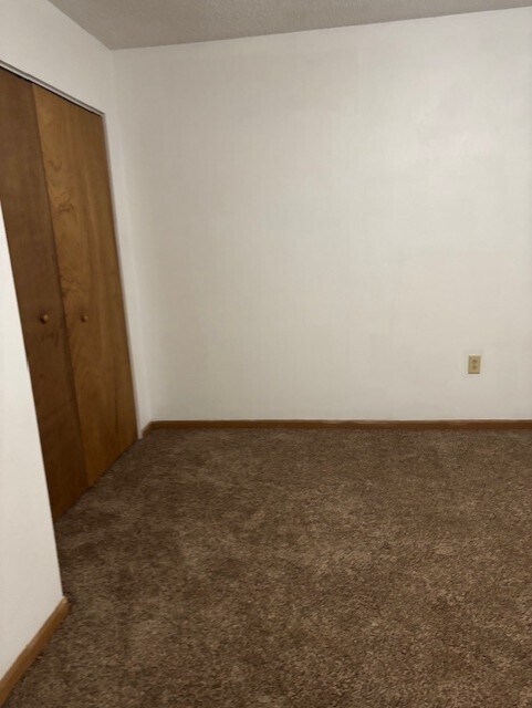 Dormitorio central para 3 habitaciones - Black Hawk Village