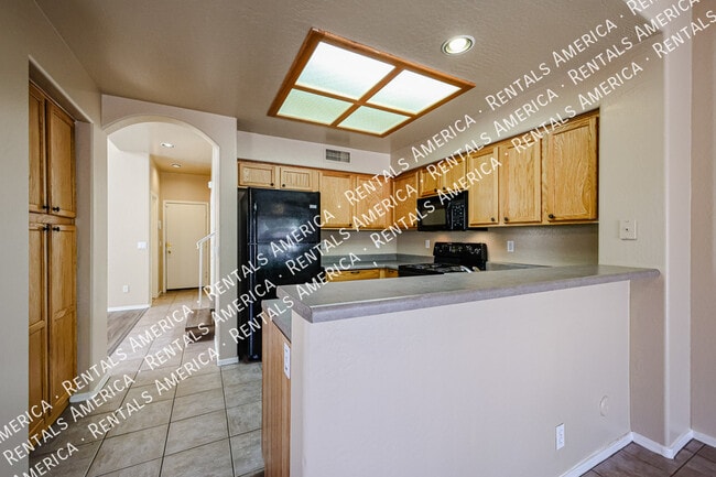 Building Photo - 10060 E Capri Ave